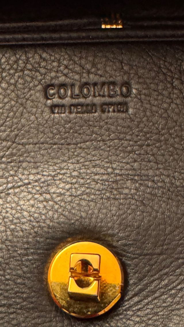 Borsa in pelle e rettile nera e verde