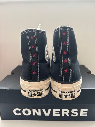 Converse plataforma negras con estrellas rosas