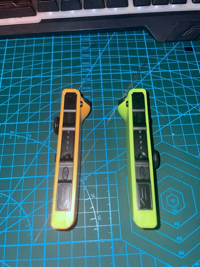 Joycons Nintendo Switch Naranja y Verde