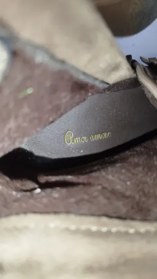 Botines marrones con flecos y tacón