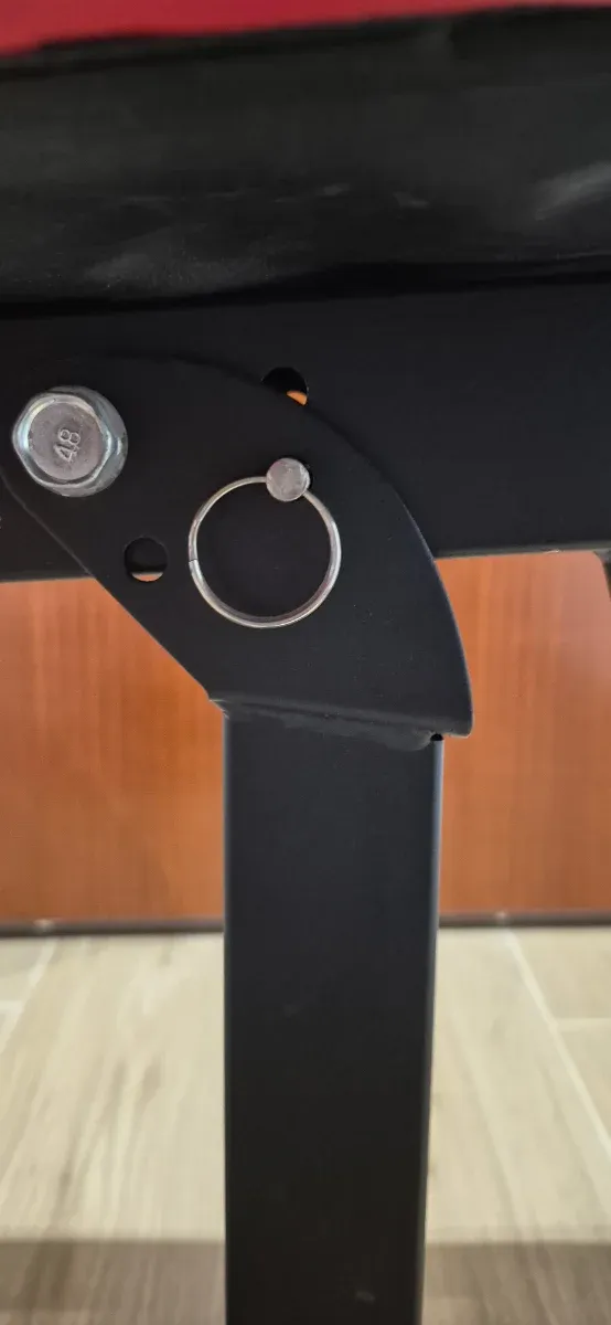 Banco de pesas plegable, mancuernas y barra z.