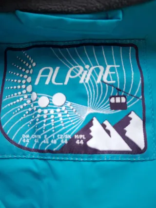 Chaqueta de nieve azul y blanca