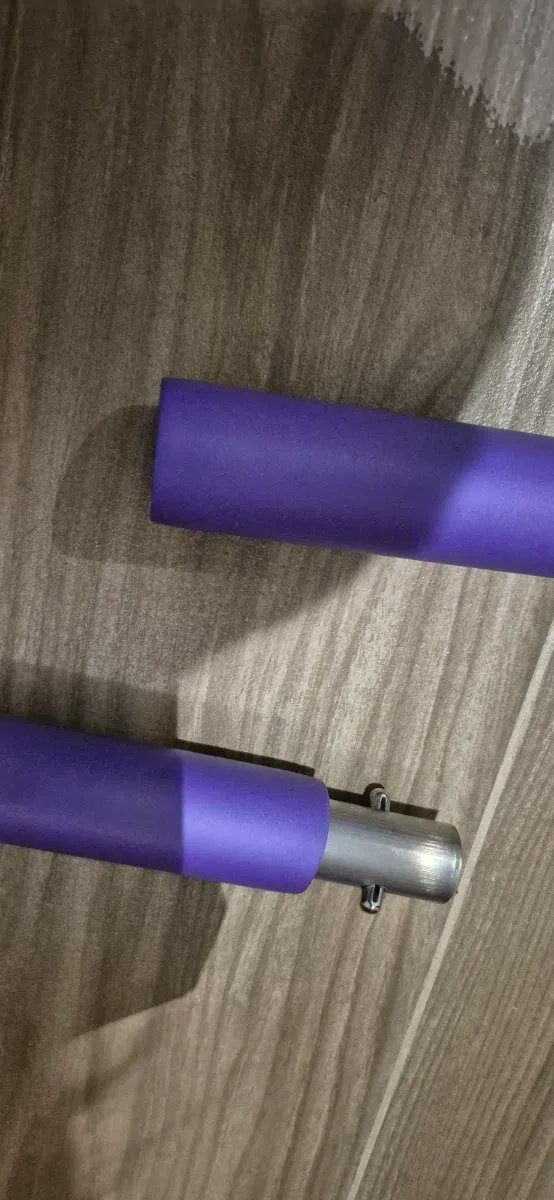 Barra de ejercicio con elástico púrpura