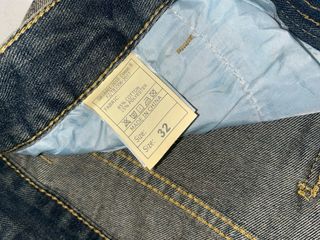 Jeans strappati uomo