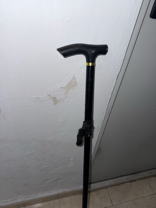 Bastón negro plegable