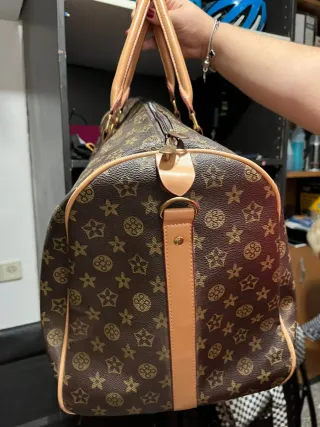 Bolsa de viaje con estampado monograma