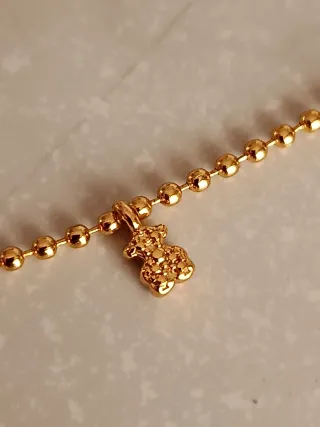 Cadena Tous Oro con Perlas y Dijes