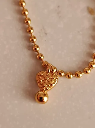 Cadena Tous Oro con Perlas y Dijes