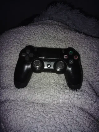 Mando PS4 Sony y cargador para el mando