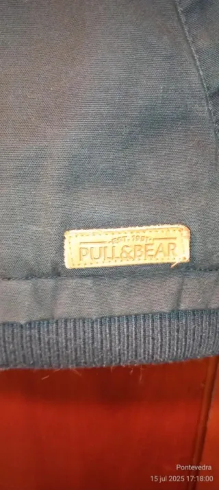 Cazadora de montaña con capucha