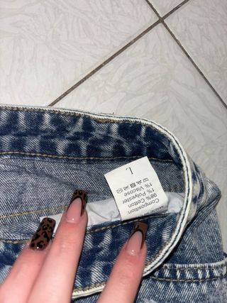 Shorts jeans strappati