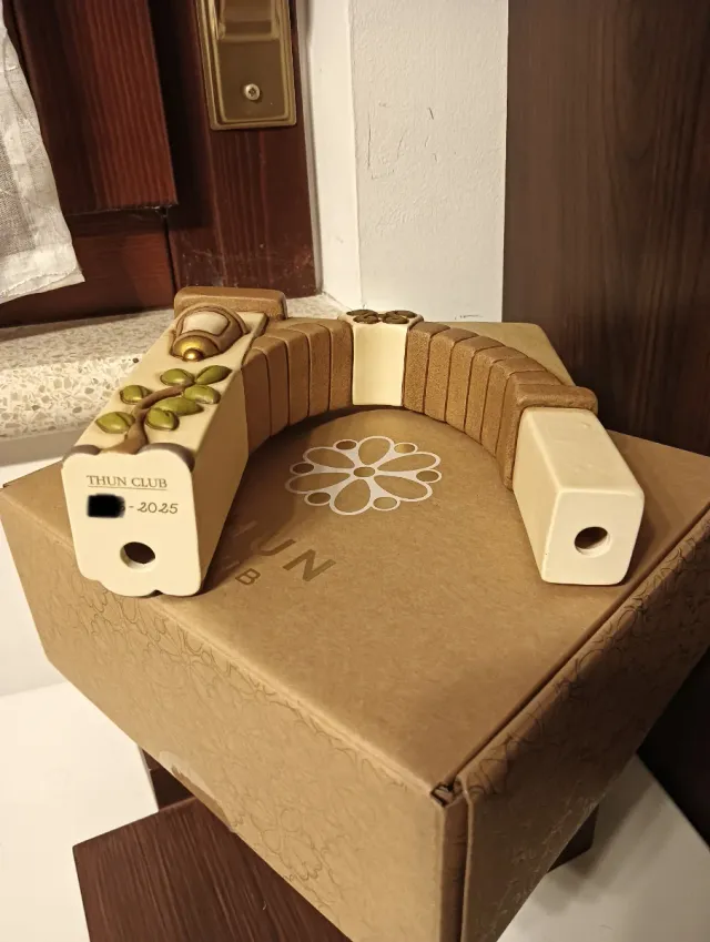 Portale Thun con lanterna e pianta