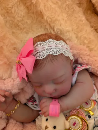 Reborn realizada con genesis horneada y barnizada