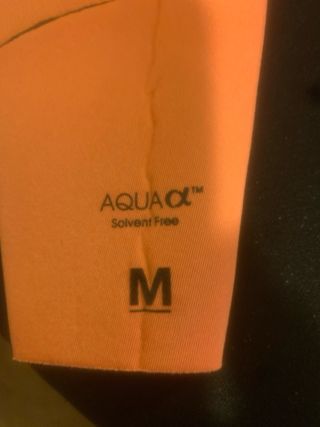 Traje de neopreno mujer coral y burdeos