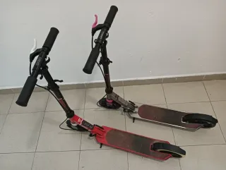 Patinete Oxelo Rojo y negro y otro morado y negro