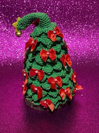 Alberello decorativo con fiocchi rossi