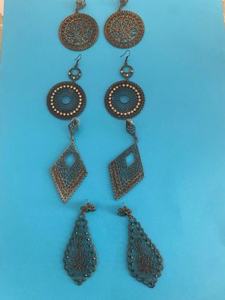 4 paia orecchini metallo forati