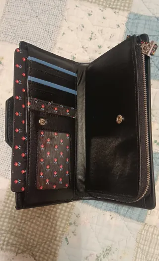 Cartera-billetera negra, Paco Martínez