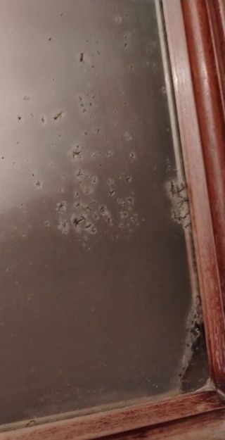 Specchio antico in legno massello