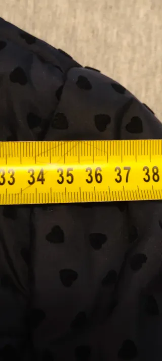 Cazadora azul con corazones