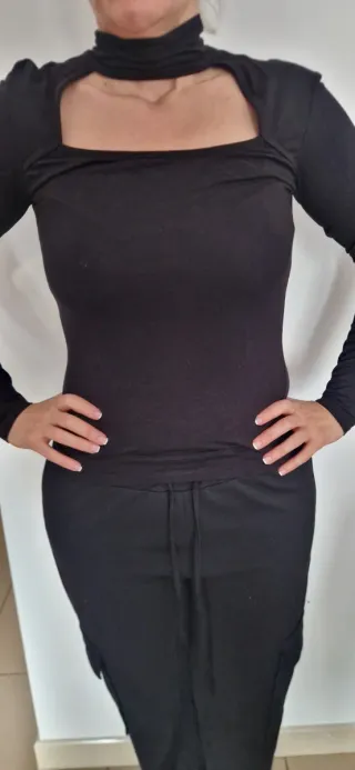 Blusa cuello abierto manga larga