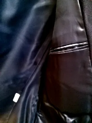 Blazer azul marino con botones dorados