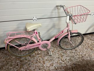 Bicicleta GAC rosa con cesta