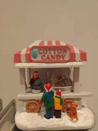 Escena Navideña puestos de algodón de azúcar