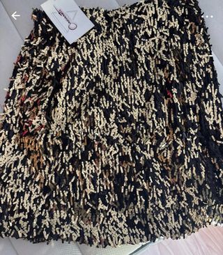 Falda fiesta lentejuelas negra y dorada