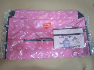Lote mochilas y monedero rosa