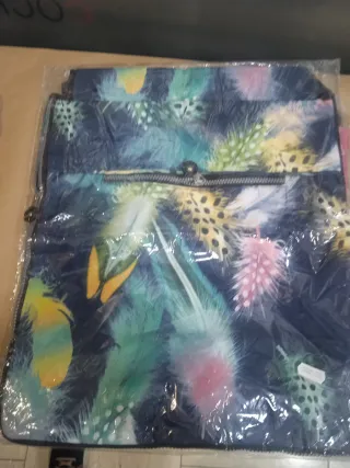 Lote mochilas y monedero rosa