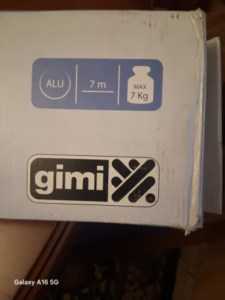 Tendedero de pared plegable metido en caja