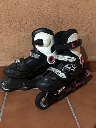 Patines ícelo en línea negros blancos y rosa