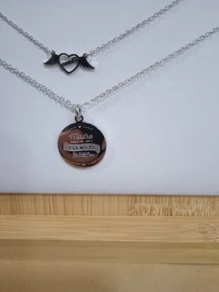 Lote 12 collares con colgantes variados de acero