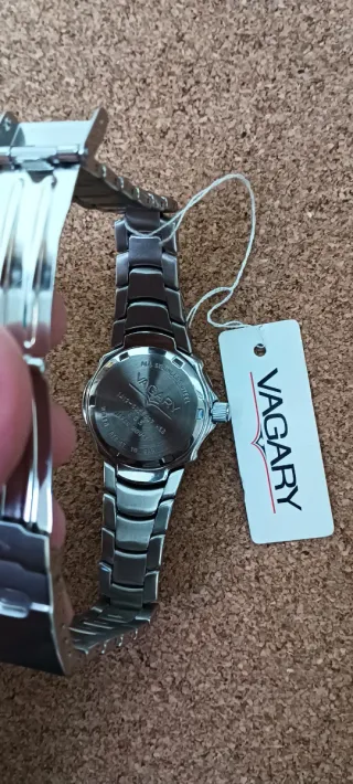 Reloj Vagary Plata y Beige