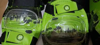 Casco y protecciones bicicleta verde