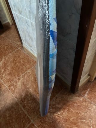 Tabla de surf azul geométrica