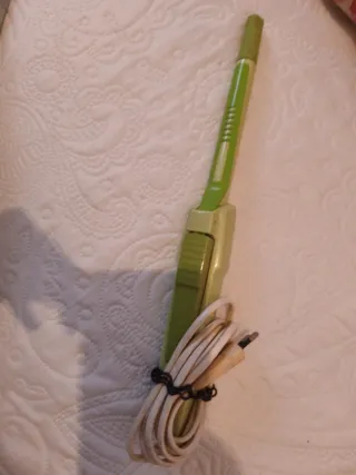 Rizador de pelo verde