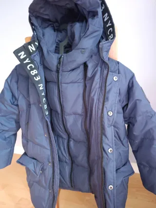 Chaqueta plumífero azul talla 7-8