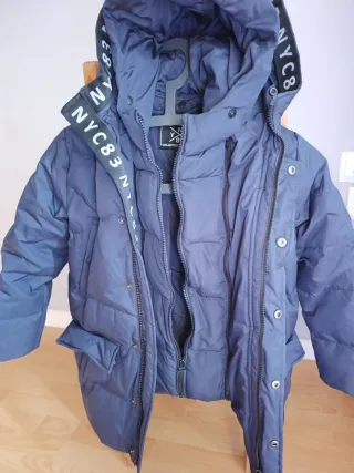 Chaqueta plumífero azul talla 7-8
