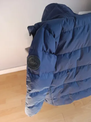 Chaqueta plumífero azul talla 7-8