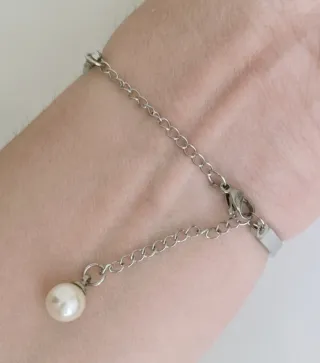 Pulsera acero con perla.