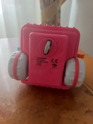 Muñeco robot a cuerda rosa