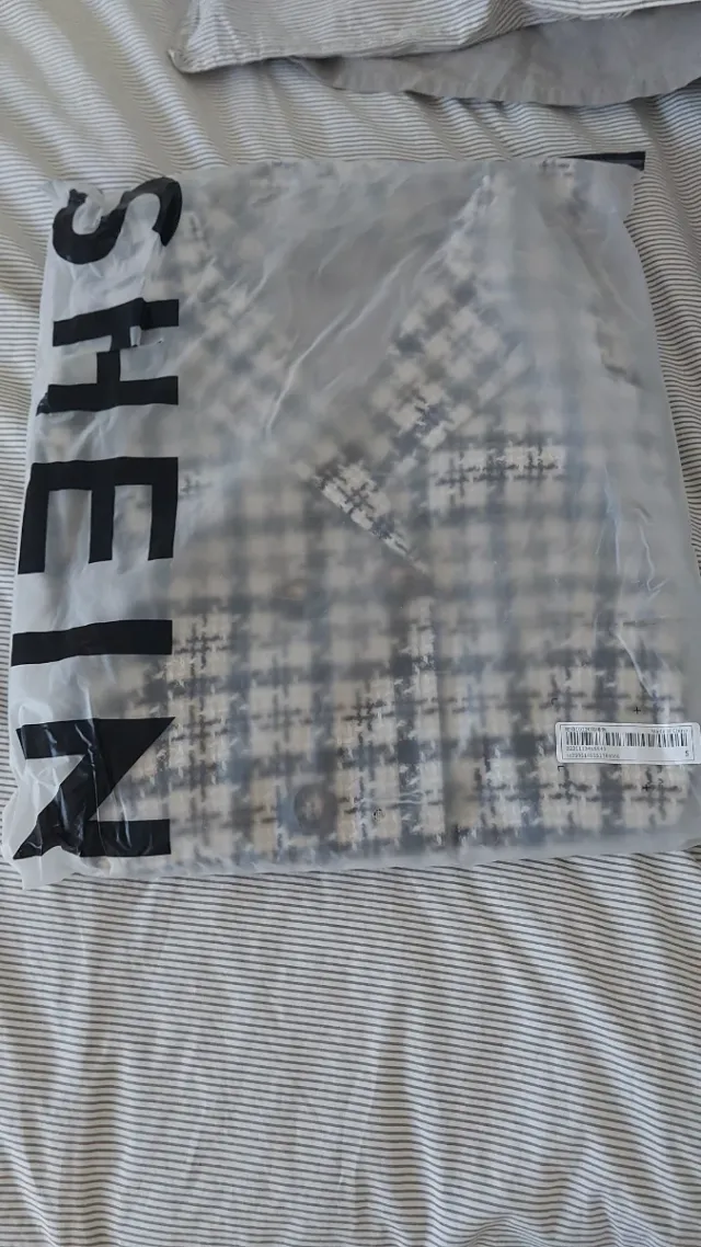 Cazadora cuadros beige y marron