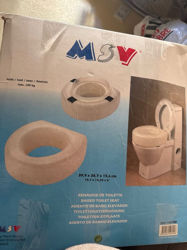 Asiento elevador para baño