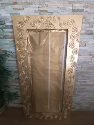 Espejo decorativo dorado