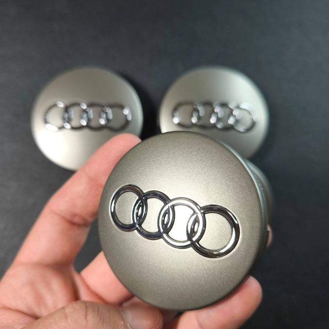 TAPABUJES AUDI 60mm GRIS - EMBLEMA LLANTAS AUDI