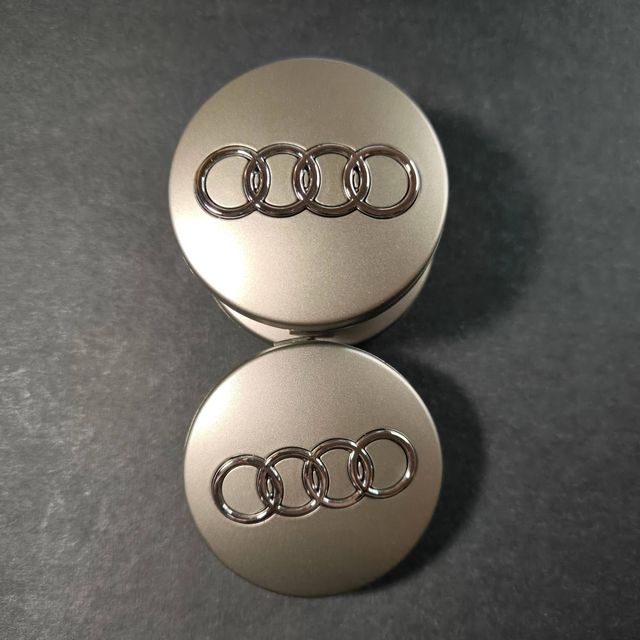 TAPABUJES AUDI 60mm GRIS - EMBLEMA LLANTAS AUDI