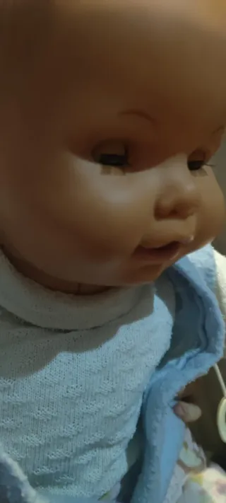 Muñeco bebe grande electrónico.