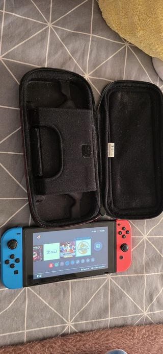 Nintendo Switch  + Caja y Accesorios